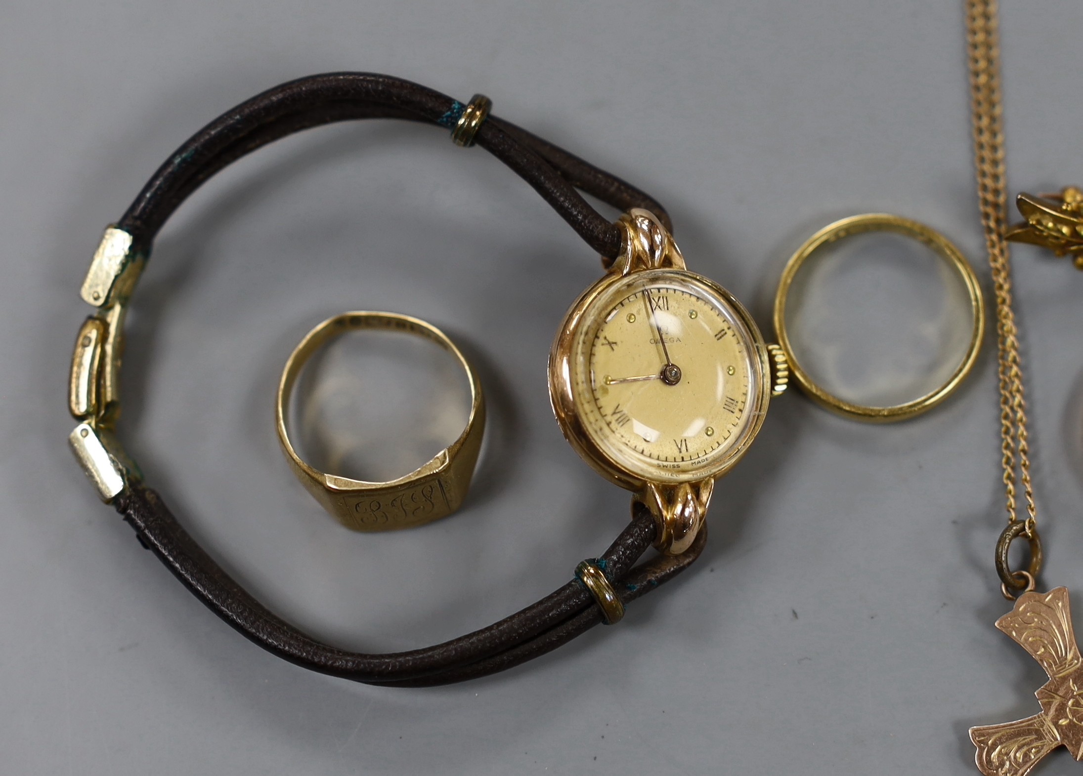 A lady's 9ct gold Accurist manual wind wrist watch, on a 9ct gold bracelet, gross weight 11.2 grams, one other lady's yellow metal wrist watch, three 9ct gold rings, a 9ct gold bracelet, a 9ct cross pendant on 9ct chain,